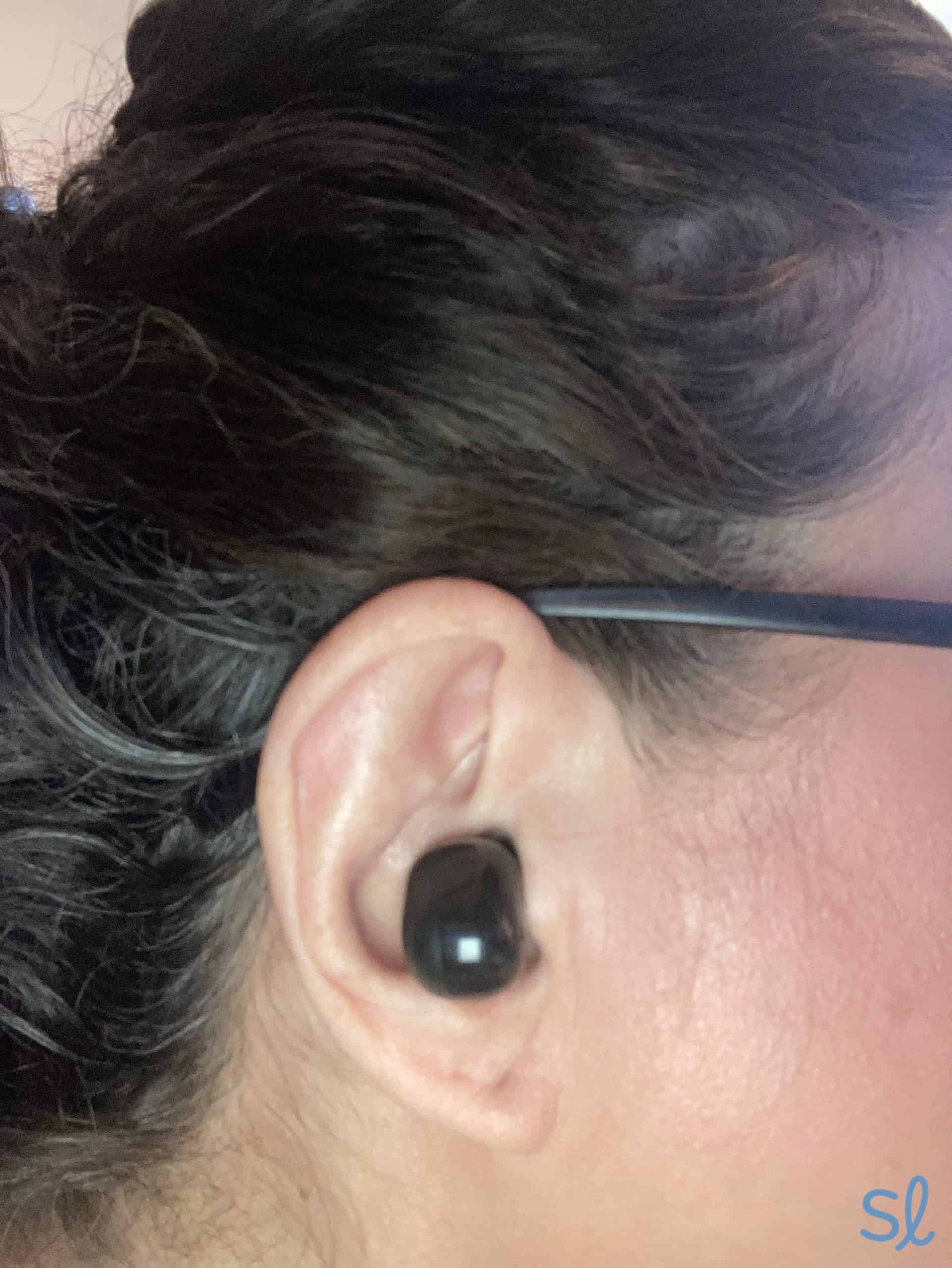 One of our testers wearing LINK by Eargo hearing aids 